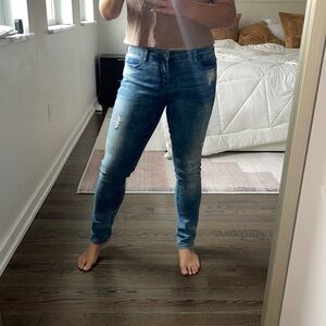 Blank NYC Mid-rise skinny Denim Jeans.